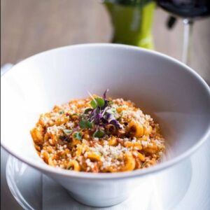 Baked Anelletti, Beef and Pork Sausage Ragù, English Peas, Tre Formaggi